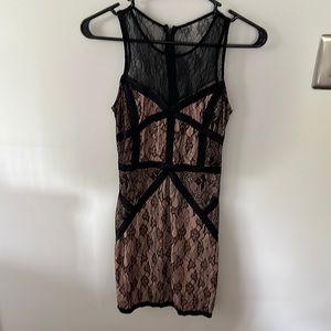 Sexy lace black dress. Lined with cream material.
